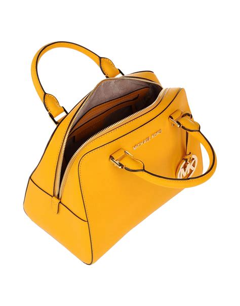 michael kors wallet yellow|Michael Kors mustard yellow purse.